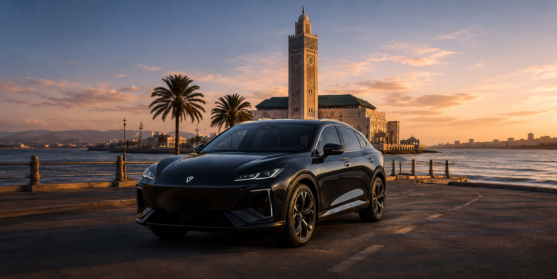 Luxury black SUV in front of the Hassan II Mosque in Casablanca at sunset